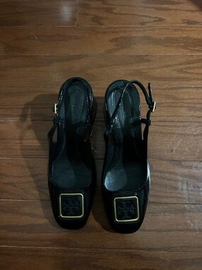 Tory Burch Black Patent Slingback Pumps with Gold Logo Plaque